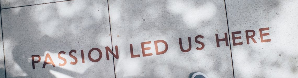 two person standing on gray tile paving